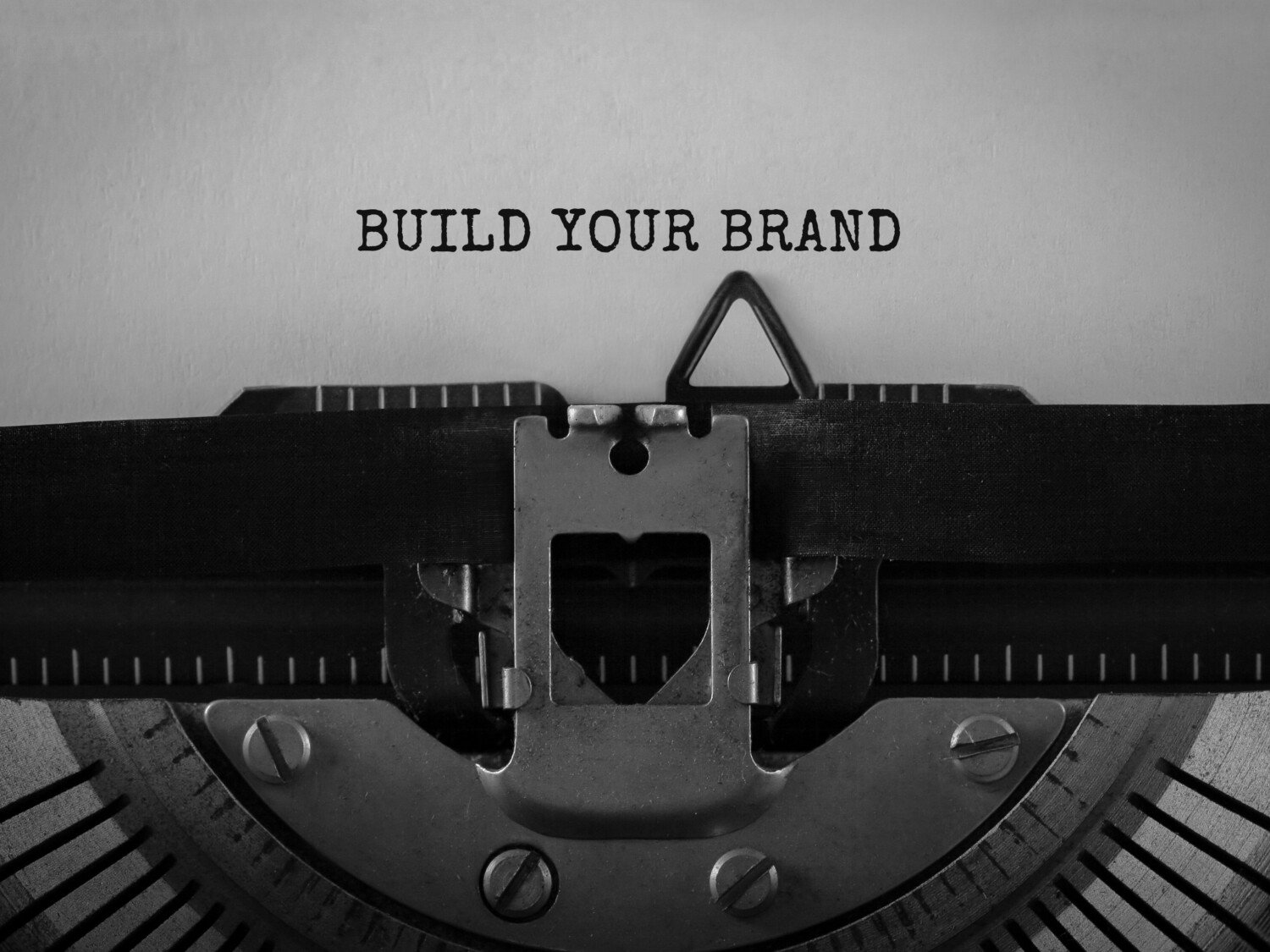 Text Build Your Brand typed on retro typewriter