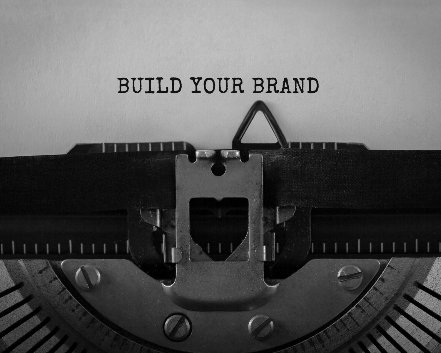 Text Build Your Brand typed on retro typewriter