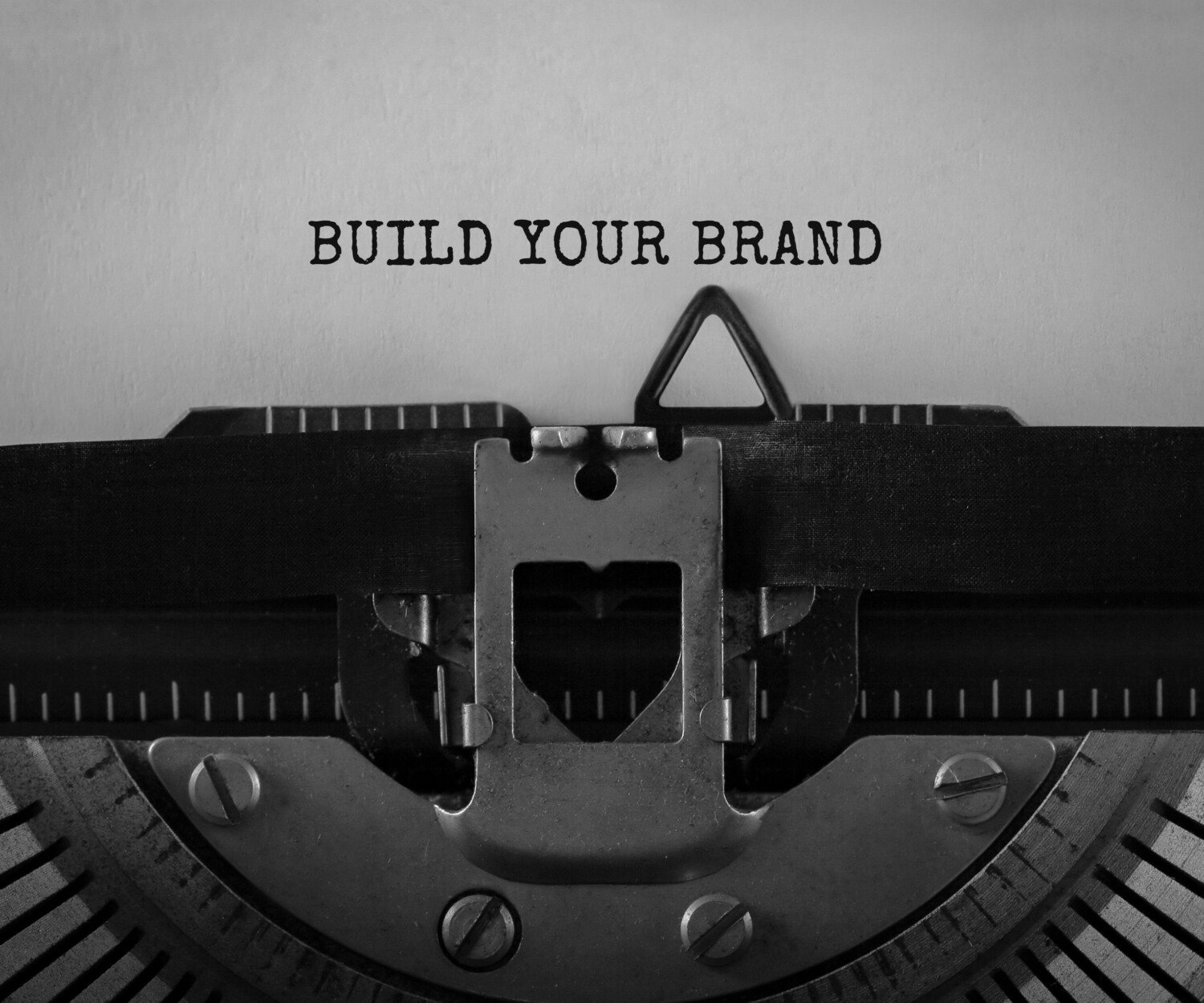 Text Build Your Brand typed on retro typewriter